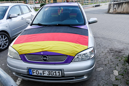 Car with German football colors in Erlangen