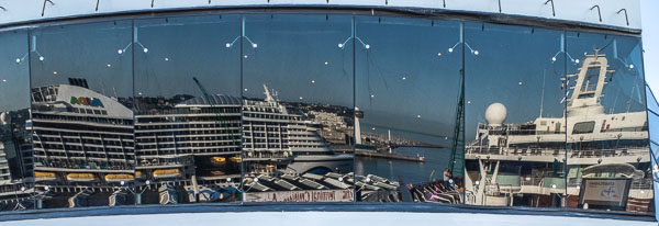 Port of Le Havre reflected in MSC PREZIOSA's windows
