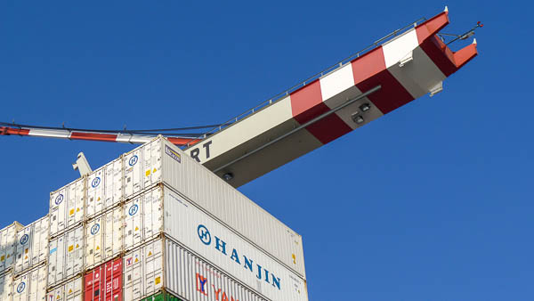 Shipping containers and cranes in Hamburg, Germany.