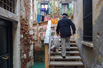 Maggie and Durant Imboden on wooden bridge in Venice, Italy
