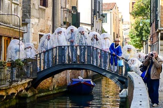 Tourists on bridge in Venice